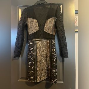 Beautifully detailed black/tan lace mini dress from Express